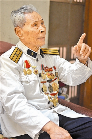 Chinese Jamaican veteran dressed in army uniform