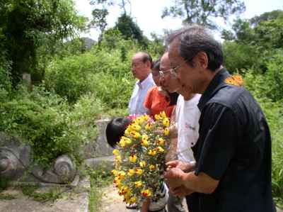 Chinese family visits ancestral graves