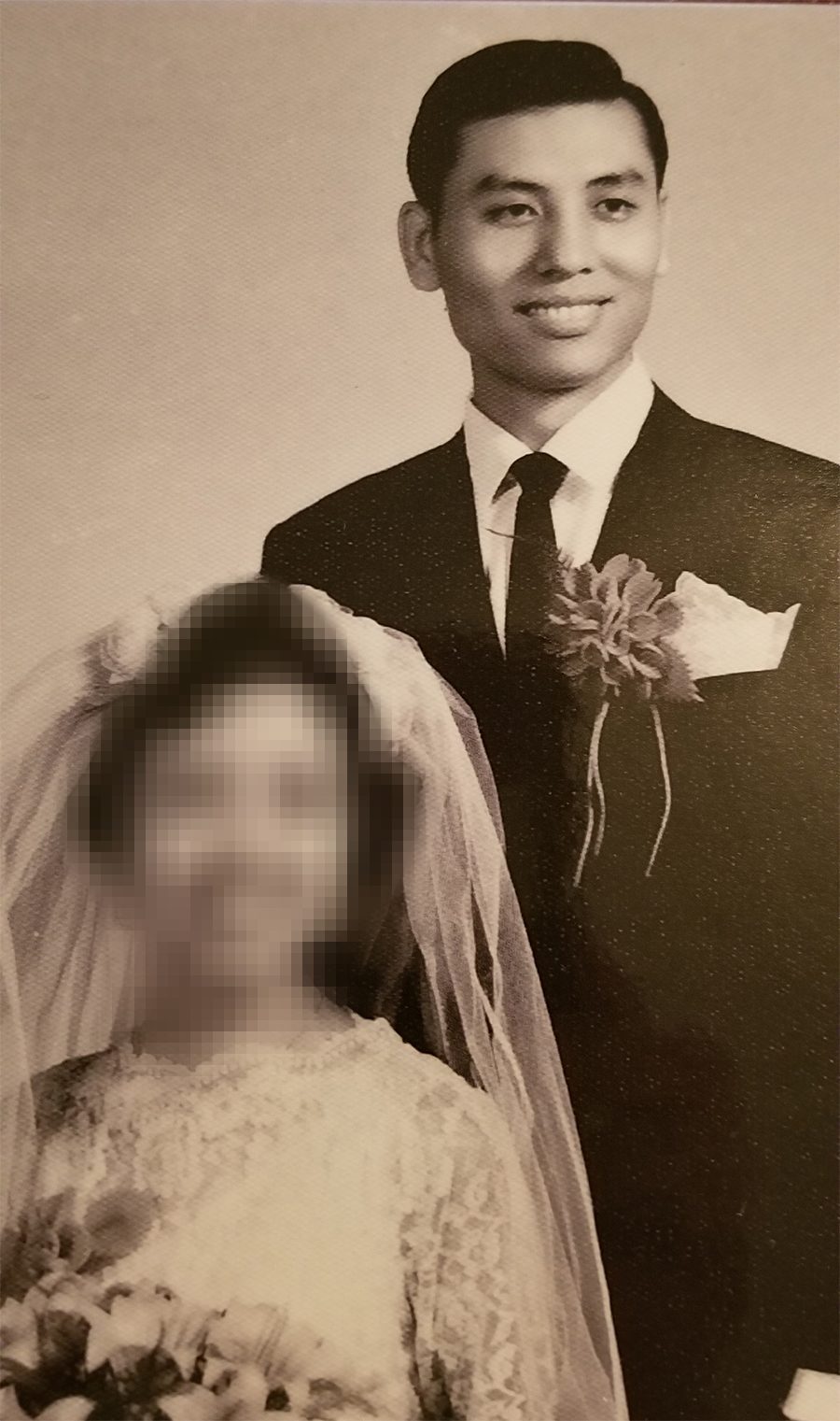 Black and white vintage portrait of newlywed Chinese couple